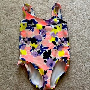 Toddler girl one-piece bathing suit and size 2T with floral pattern.